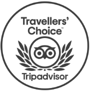A circular travel seal reading &ldquo;Traveler's Choice&rdquo; with a laurel wreath, binoculars icon, and the word &ldquo;Tripadvisor&rdquo; at the bottom.